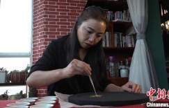 李华：指尖掐丝展现大美新疆