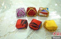 做出“最炫民族风” 新疆姑娘让“古丽娃娃”走向全国